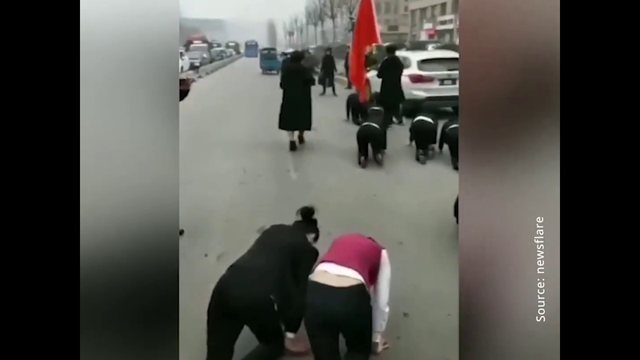 VIDEO: Chinese Workers Forced To Crawl The Streets As Punishment for Not Meeting Company’s Goals