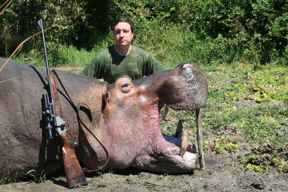 A trophy hunter With hippopotamus prize (Wikipedia)